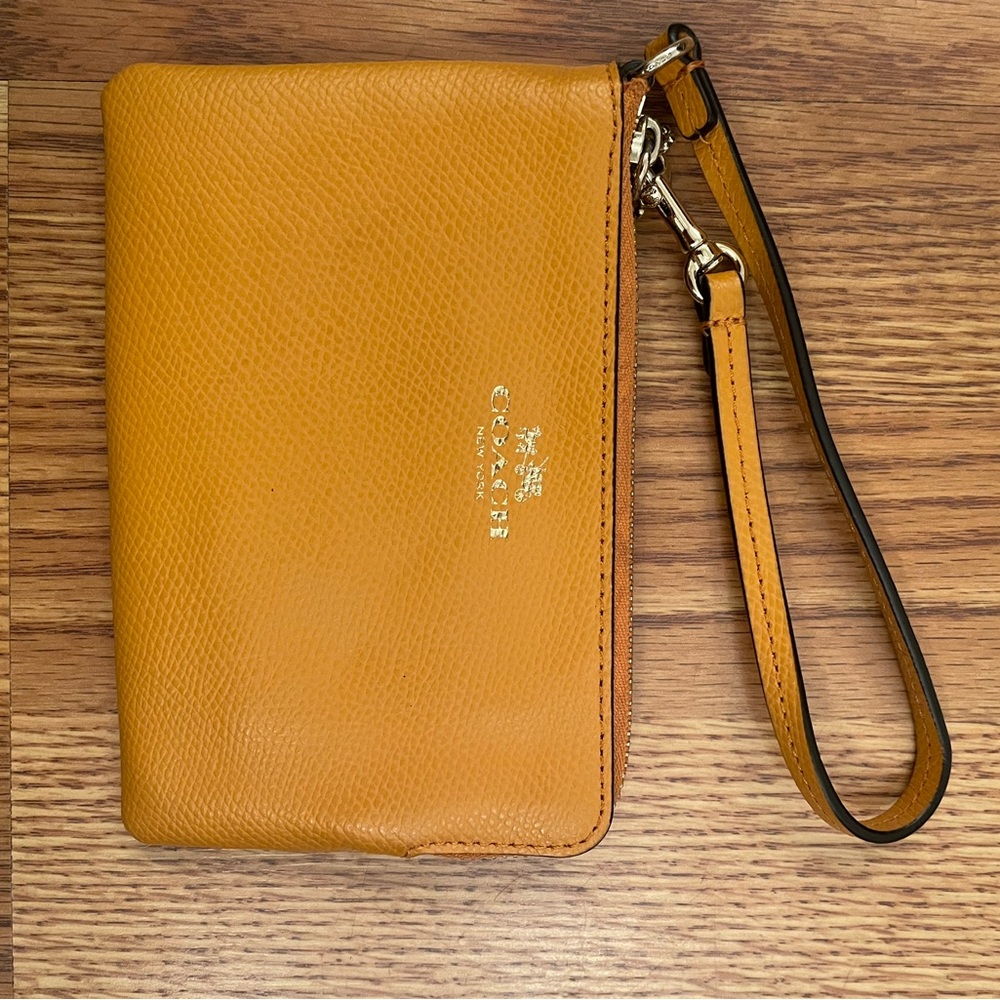 COACH Orange Wristlet